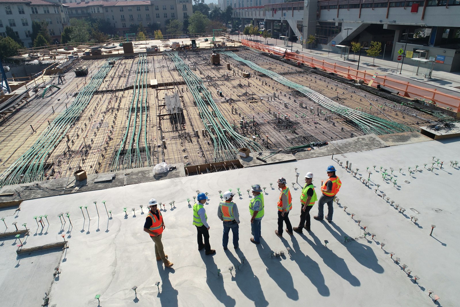 Construction site with steel framework and workers